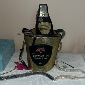 Betsey Johnson’s Champagne Bucket Crossbody bag!